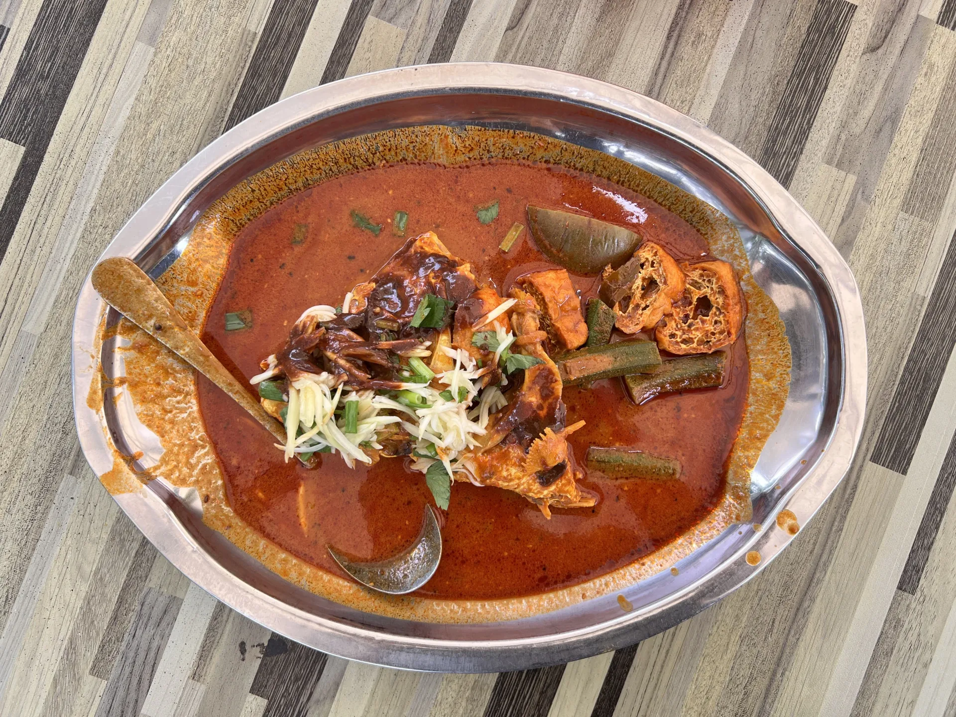 A plate of fish head curry at Tugu View Cafe in Kuala Lumpur.