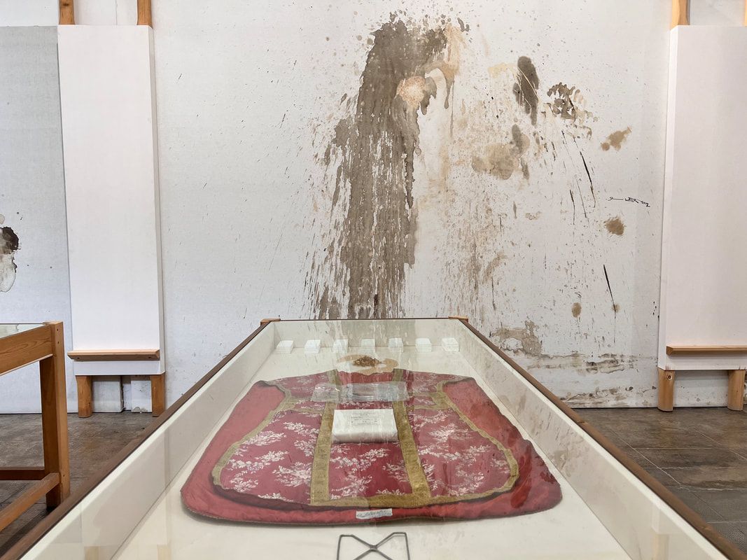 Image of the art on the wall at the Hermann Nitsch Museum in Naples, Italy.
