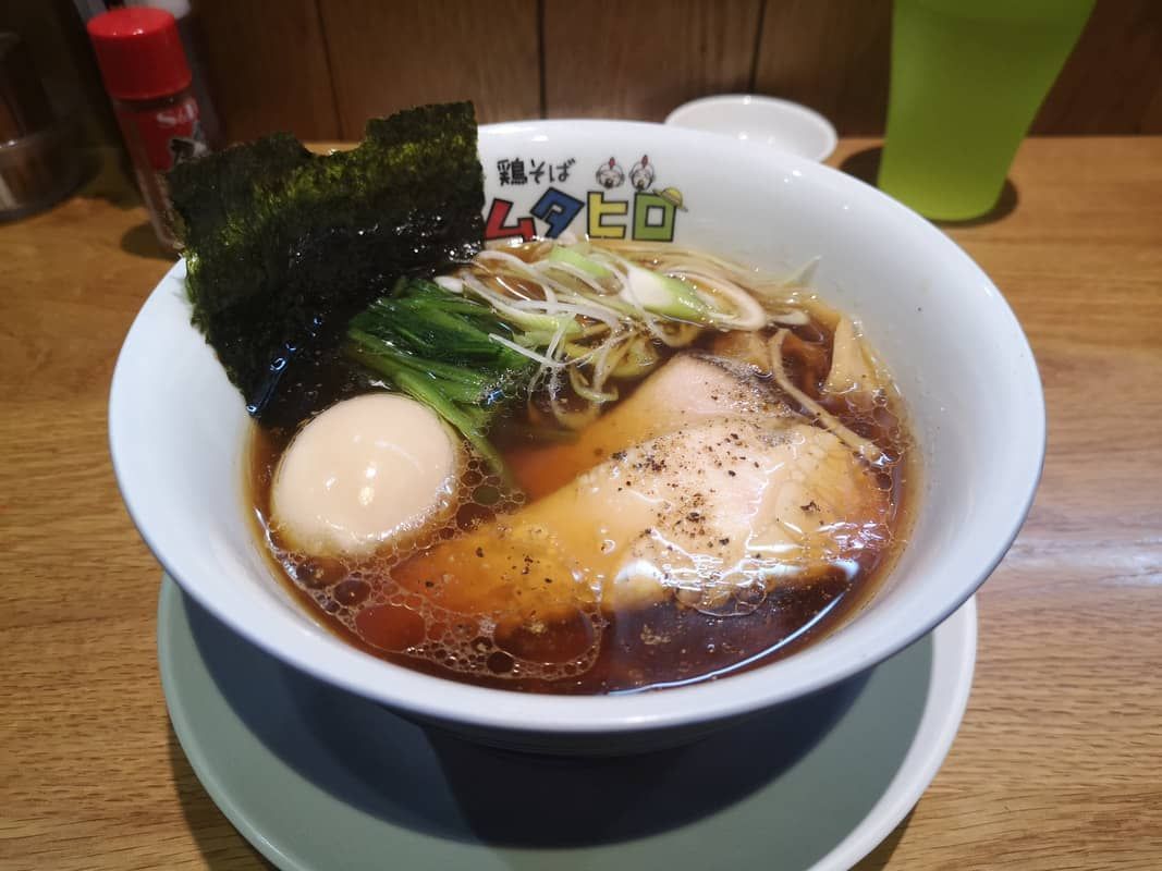 A bowl of ramen on a table in Saigon.