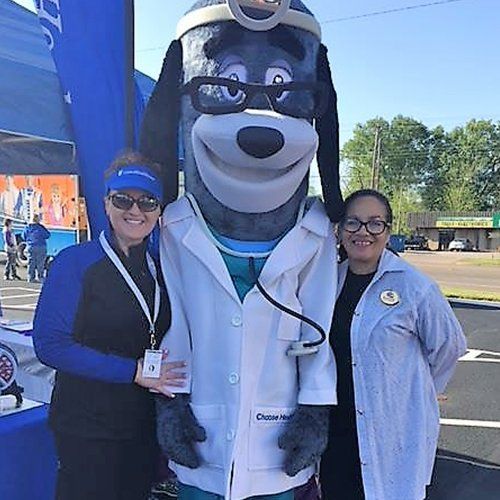 AAA staff at community event
