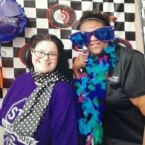 Staff at photo booth at community event