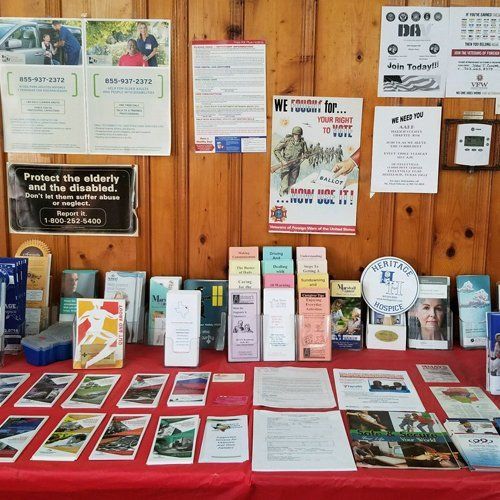 table with informational flyers
