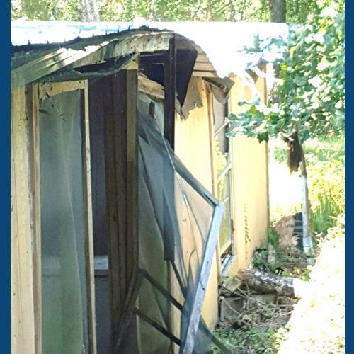 home with doorway falling apart