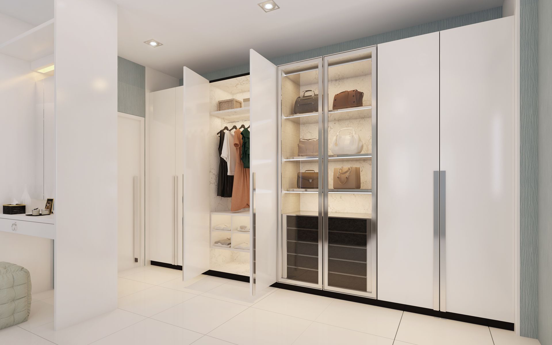 A walk in closet with a lot of clothes and handbags in it.