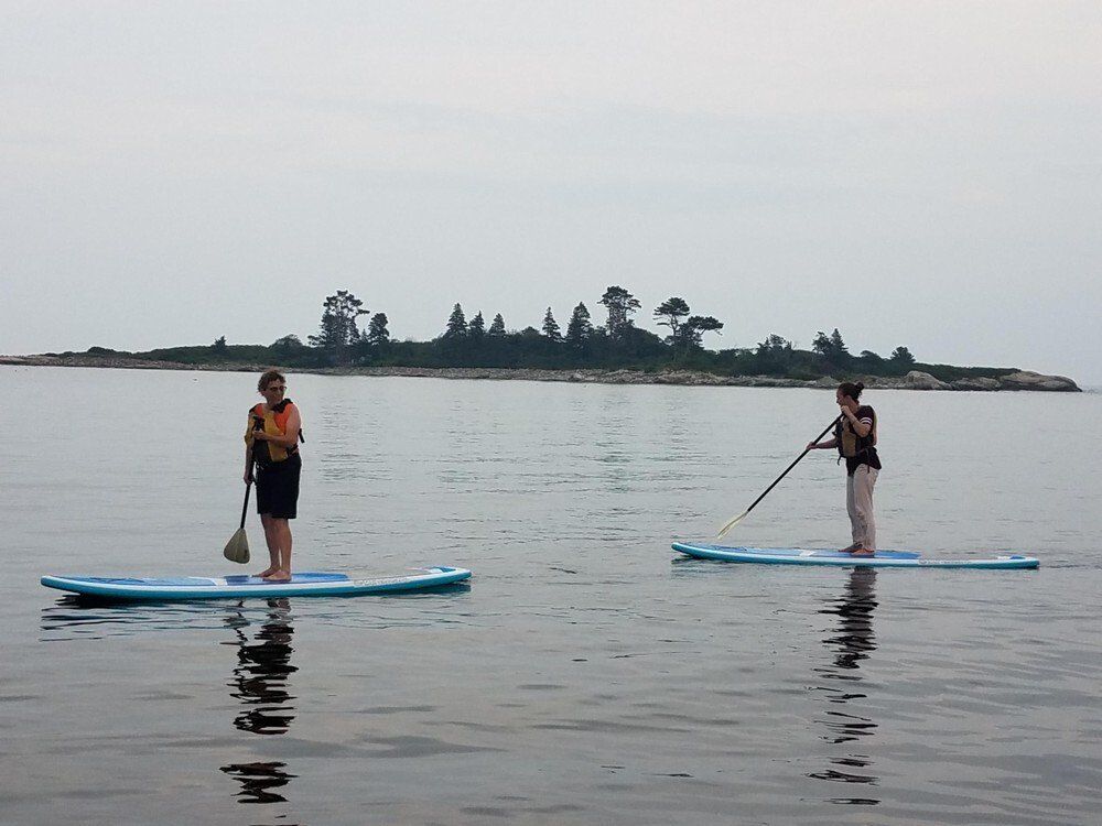 Woman on the middle of the Maine while on kayak