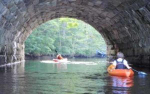 Kayaking under of tunnel