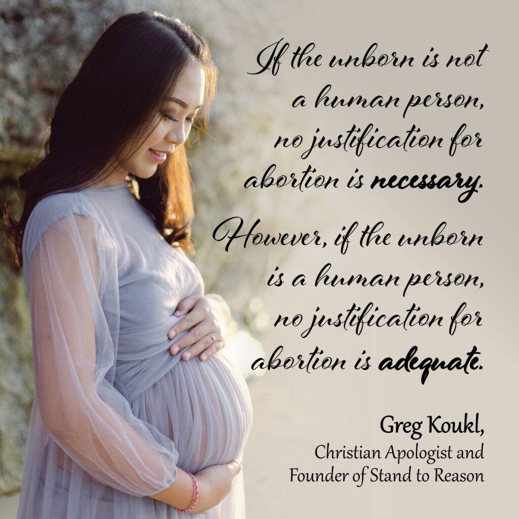 A pregnant woman is holding her belly with a quote from greg koukl.