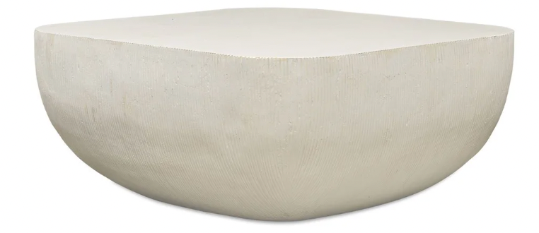 Uttermost living room coffee table at Perrino Home Furnishings.