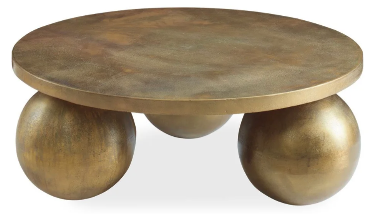 Uttermost living room coffee table at Perrino Home Furnishings.