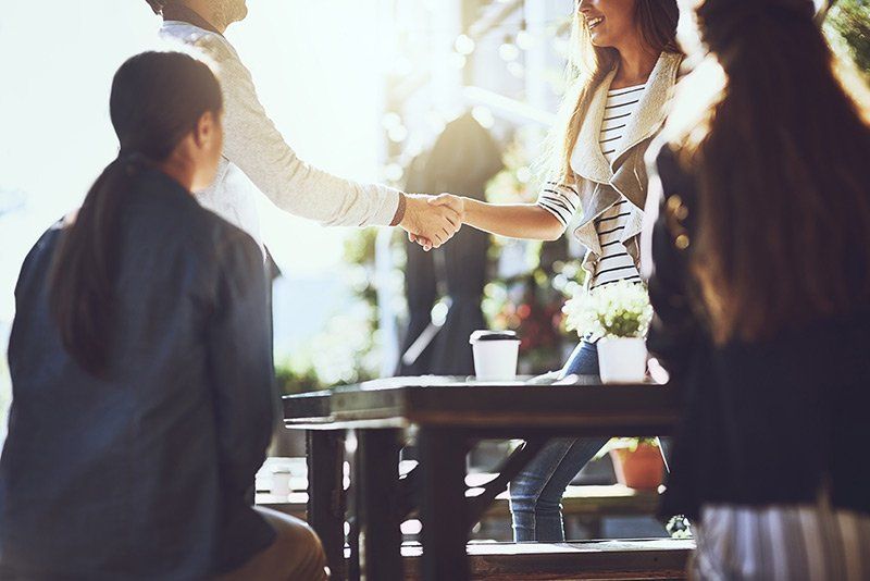 people shaking hands