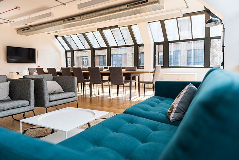 penthouse with blue couch