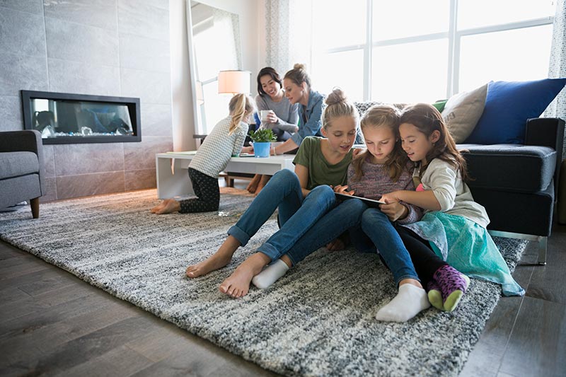 family lounging in living area