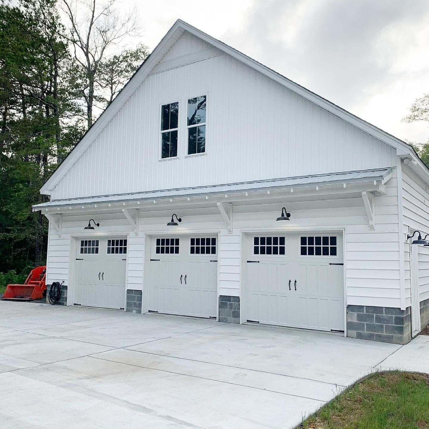 triple garage showing doors by amarr