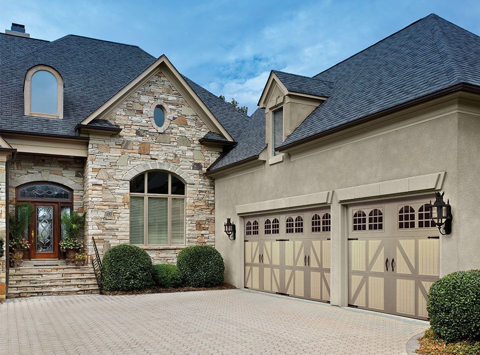 Tan Carriage house style garage doors