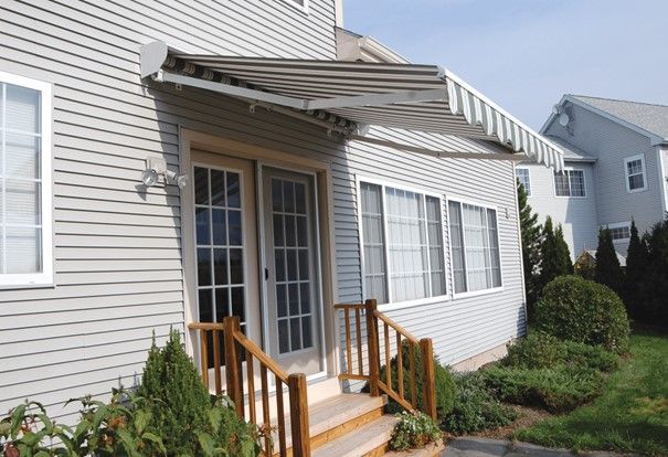 awning provides protection from sun over glass door