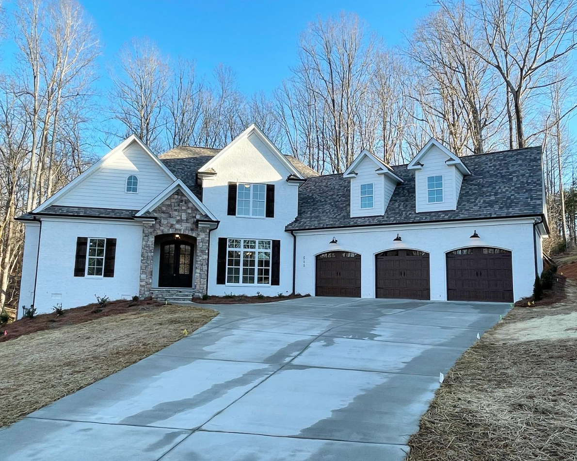 Three matching arched garage doors