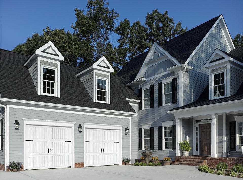 2 carriage style doors being shown