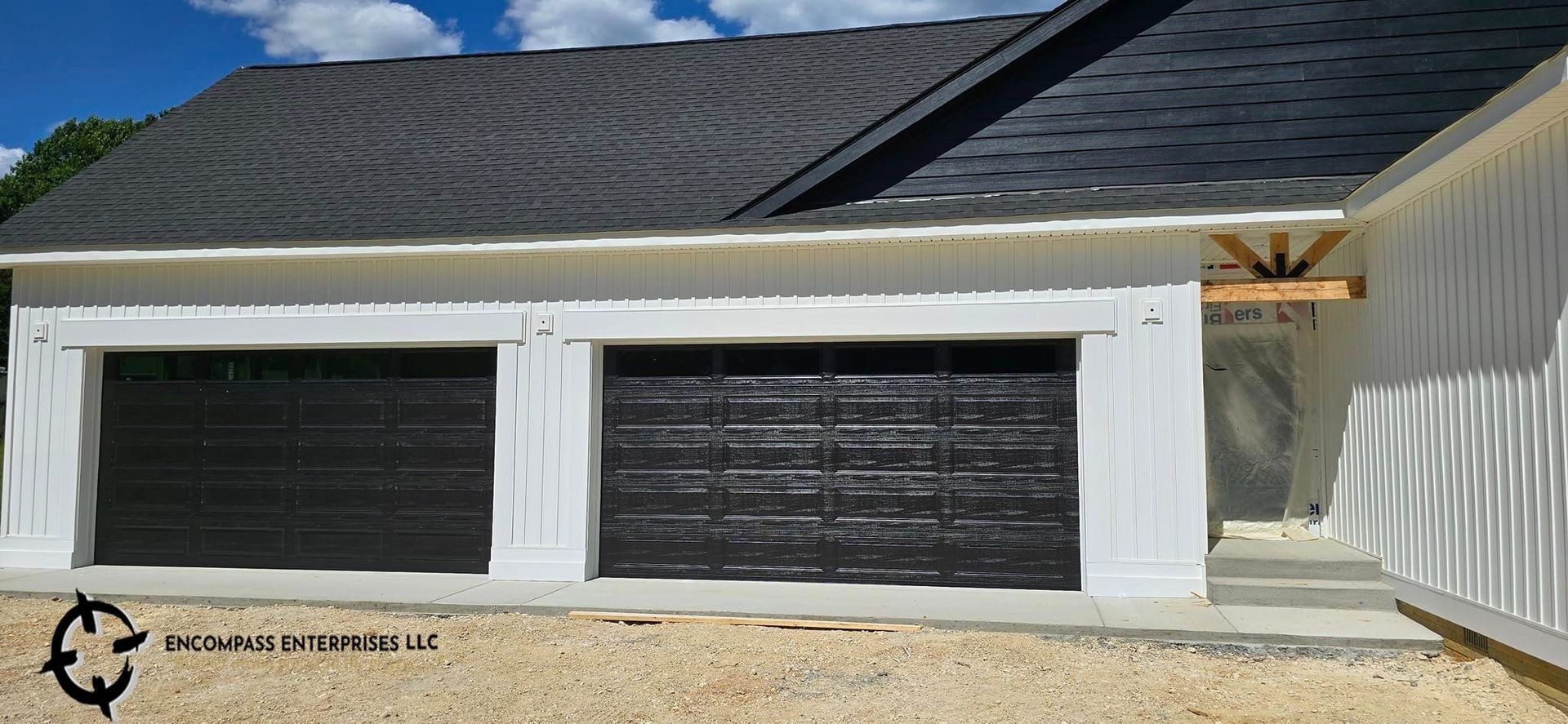 Post showing Encompass Garage Doors installed.  