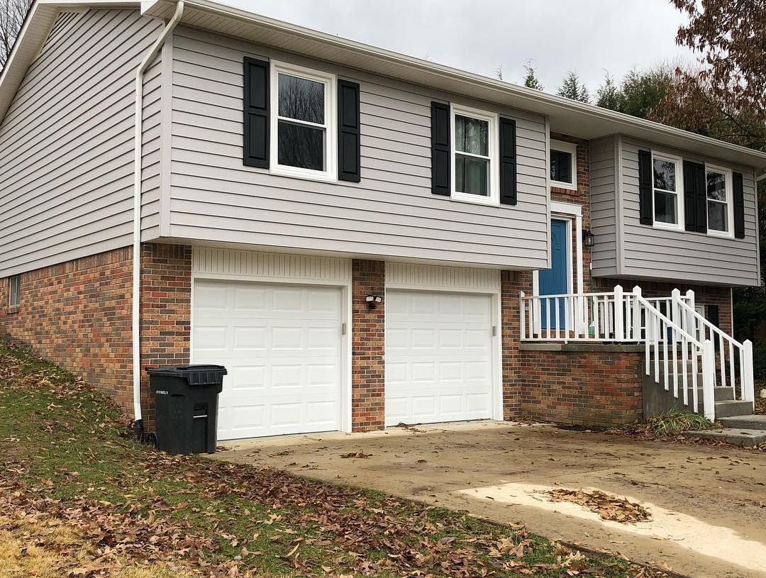 2 white garage doors being showcased.