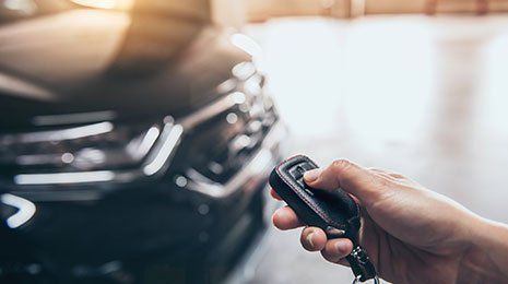 Hand Presses Car Remote Control — Laredo, TX — Outlaw Wheels & Tires