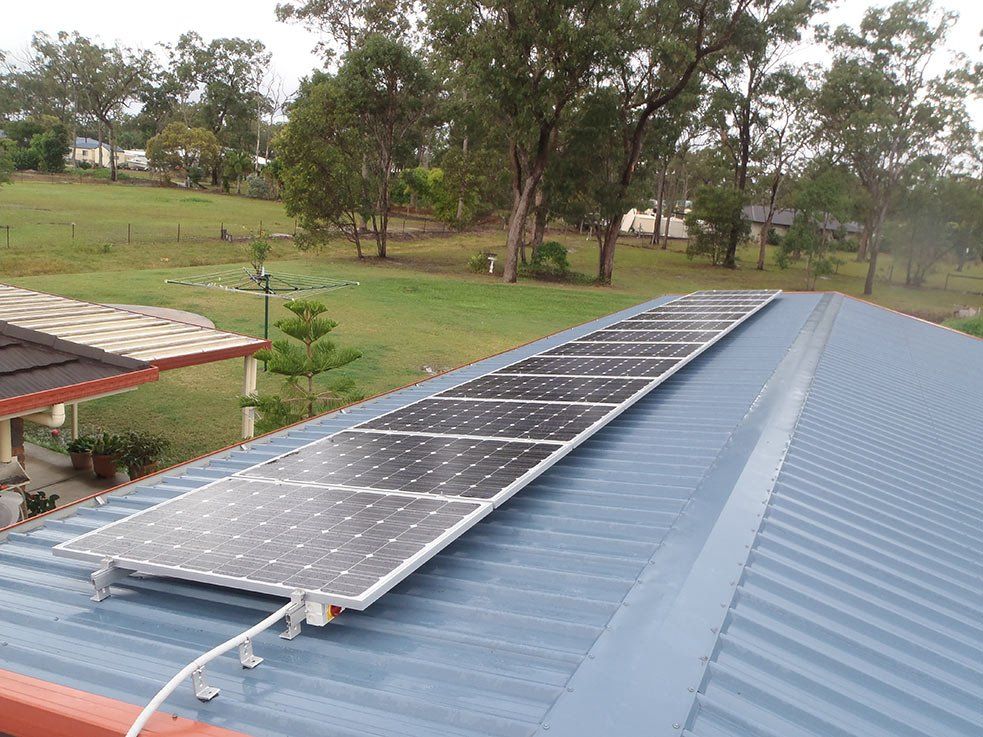 Solar Panels On A Grey Roof — Solar Panel Maintenance in Hervey Bay, QLD