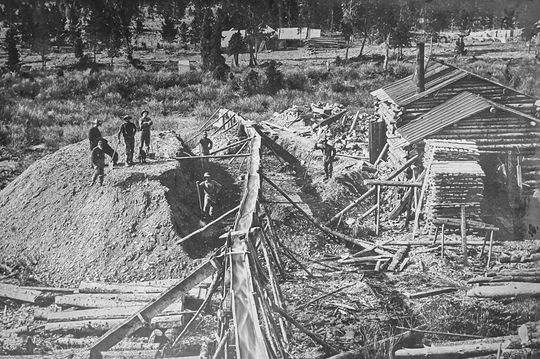 Workers moving and hauling materials in 1886.