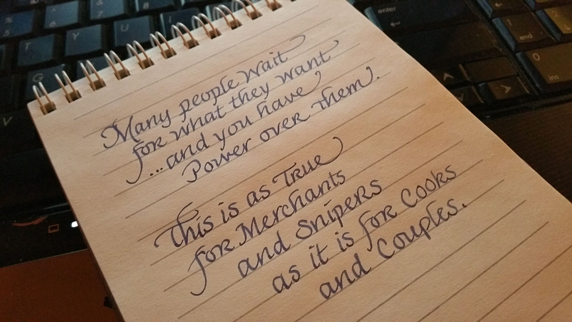 A notebook with a quote on it that says many people wait for what they want and you have power over them