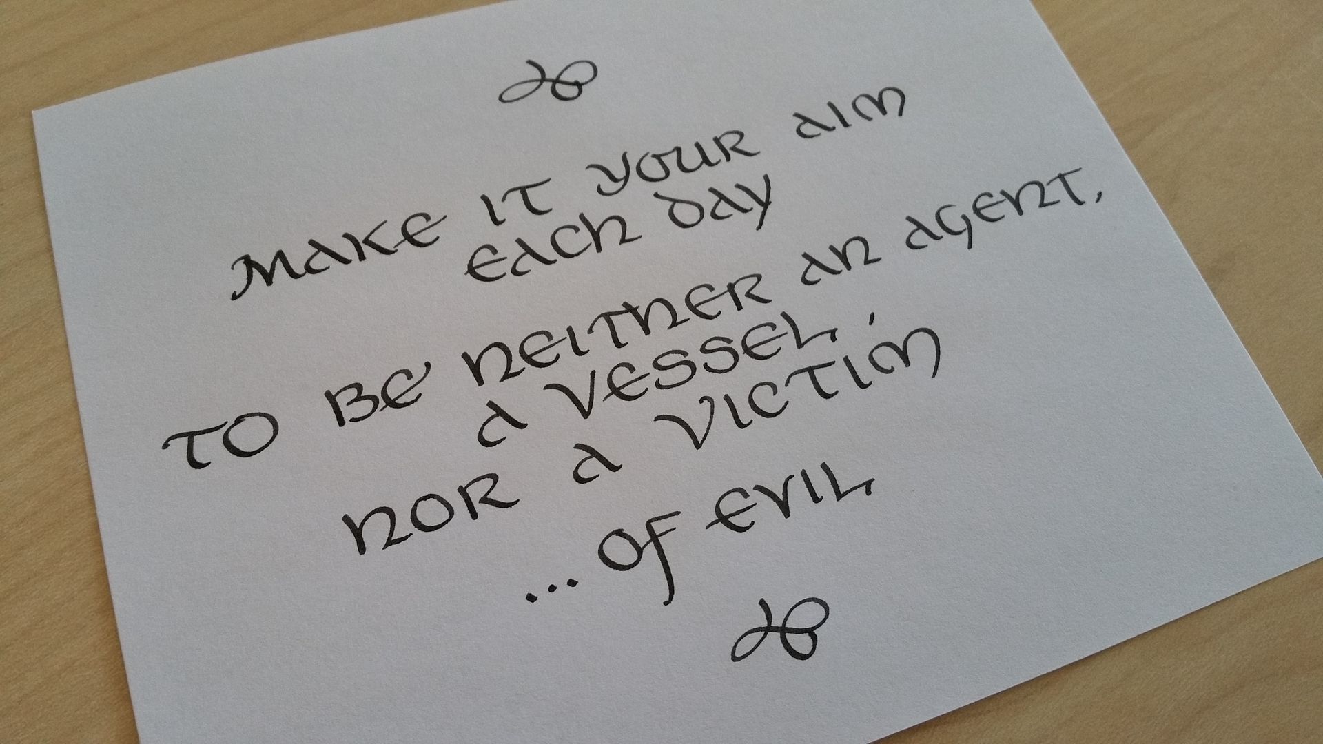 A piece of paper that says make it your aim to be neither an agent nor a victim of evil