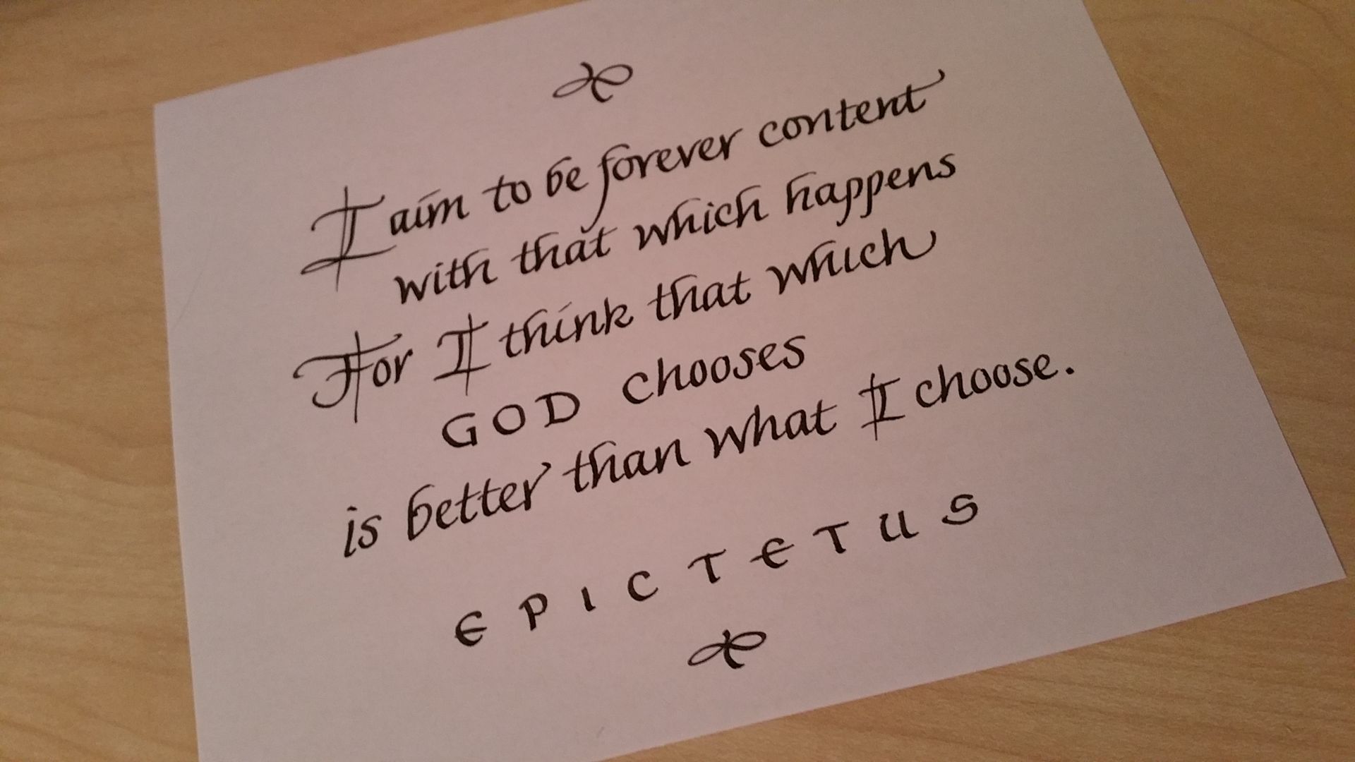 A piece of paper that says i am to be forever content with that which happens