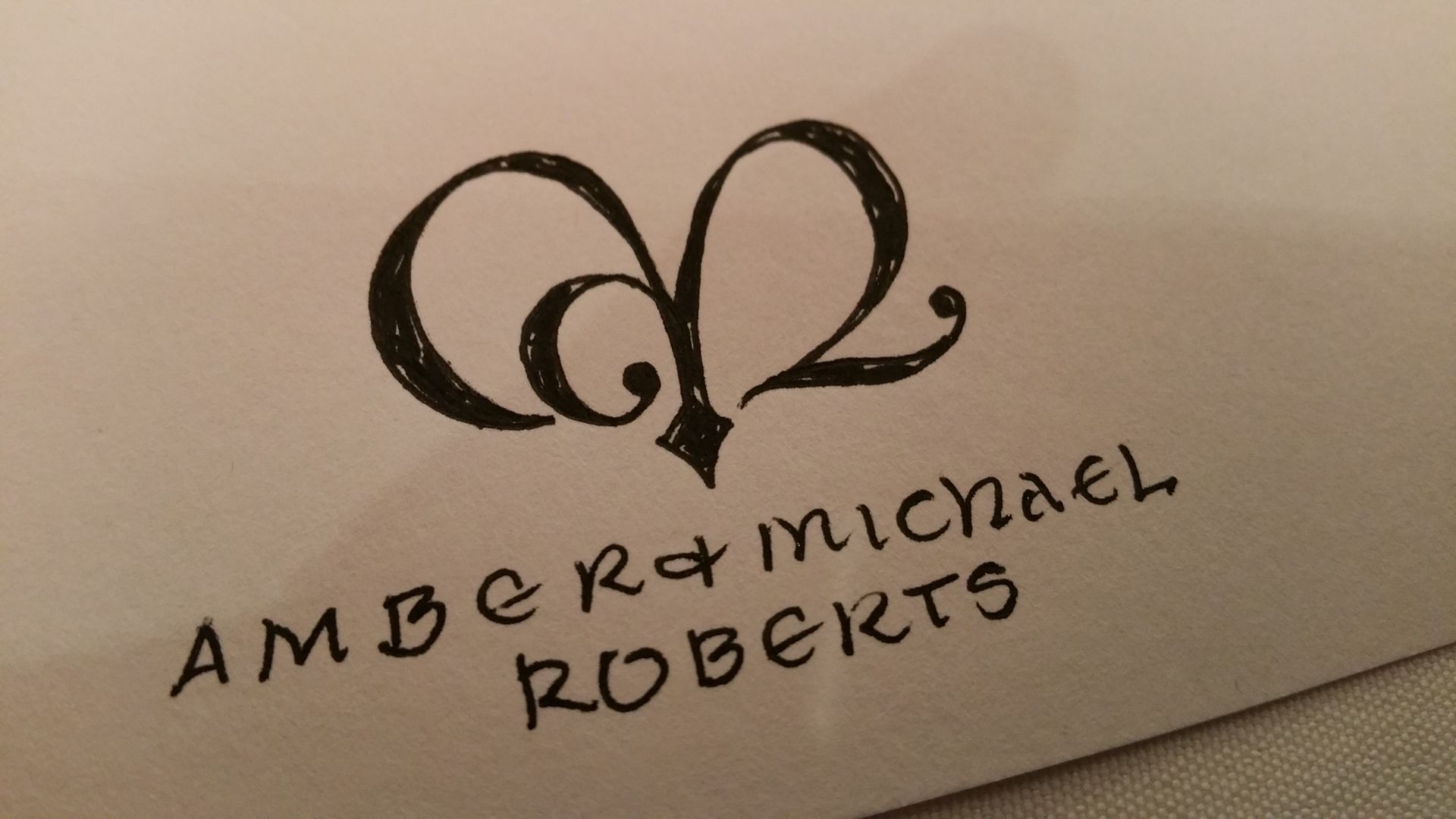 An envelope addressed to amber and michael roberts