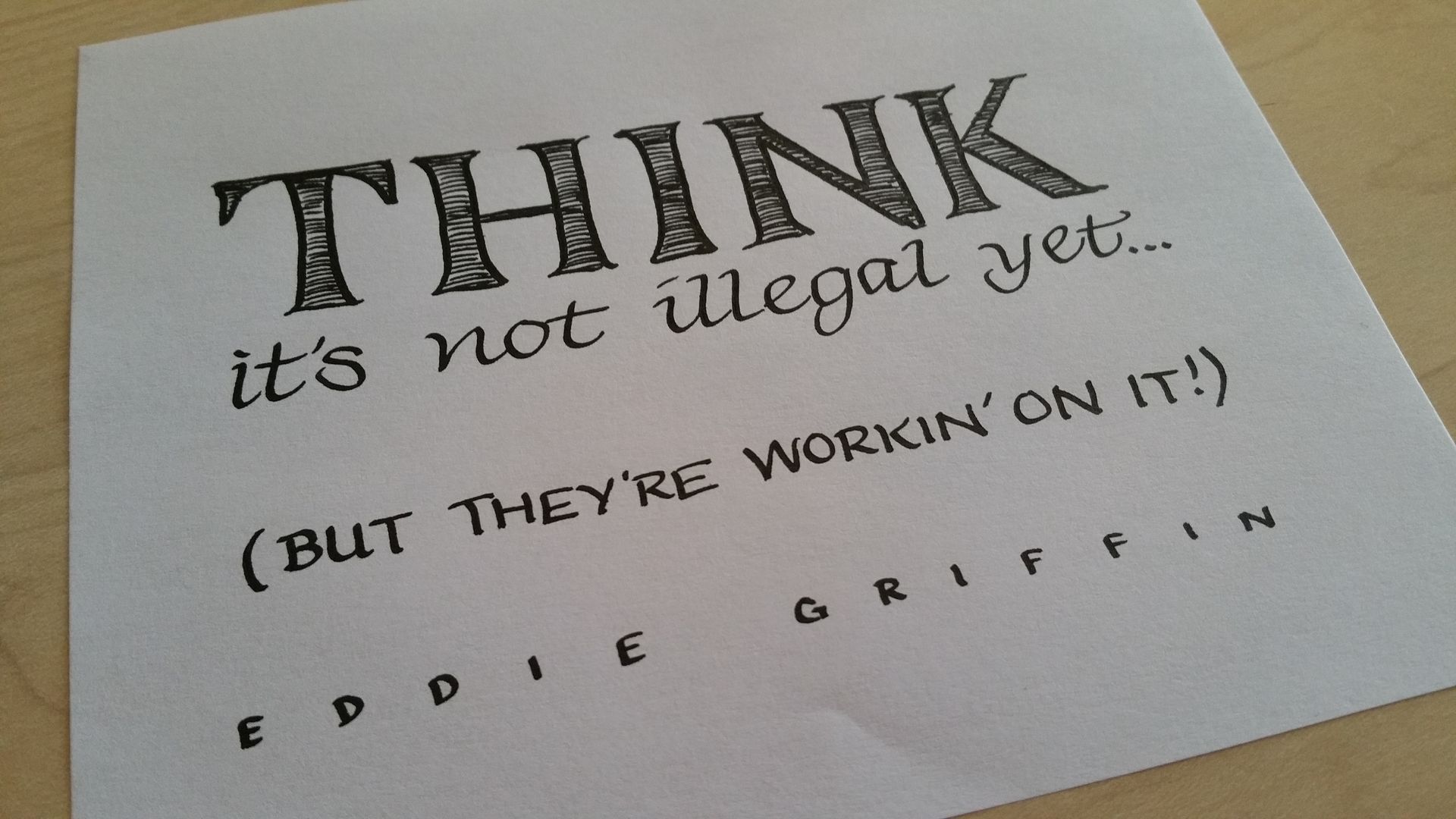 A piece of paper that says think it 's not illegal yet