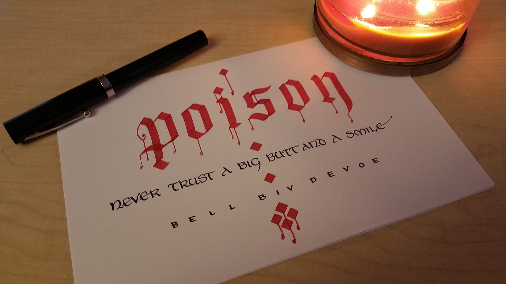 A piece of paper with the word poison written on it