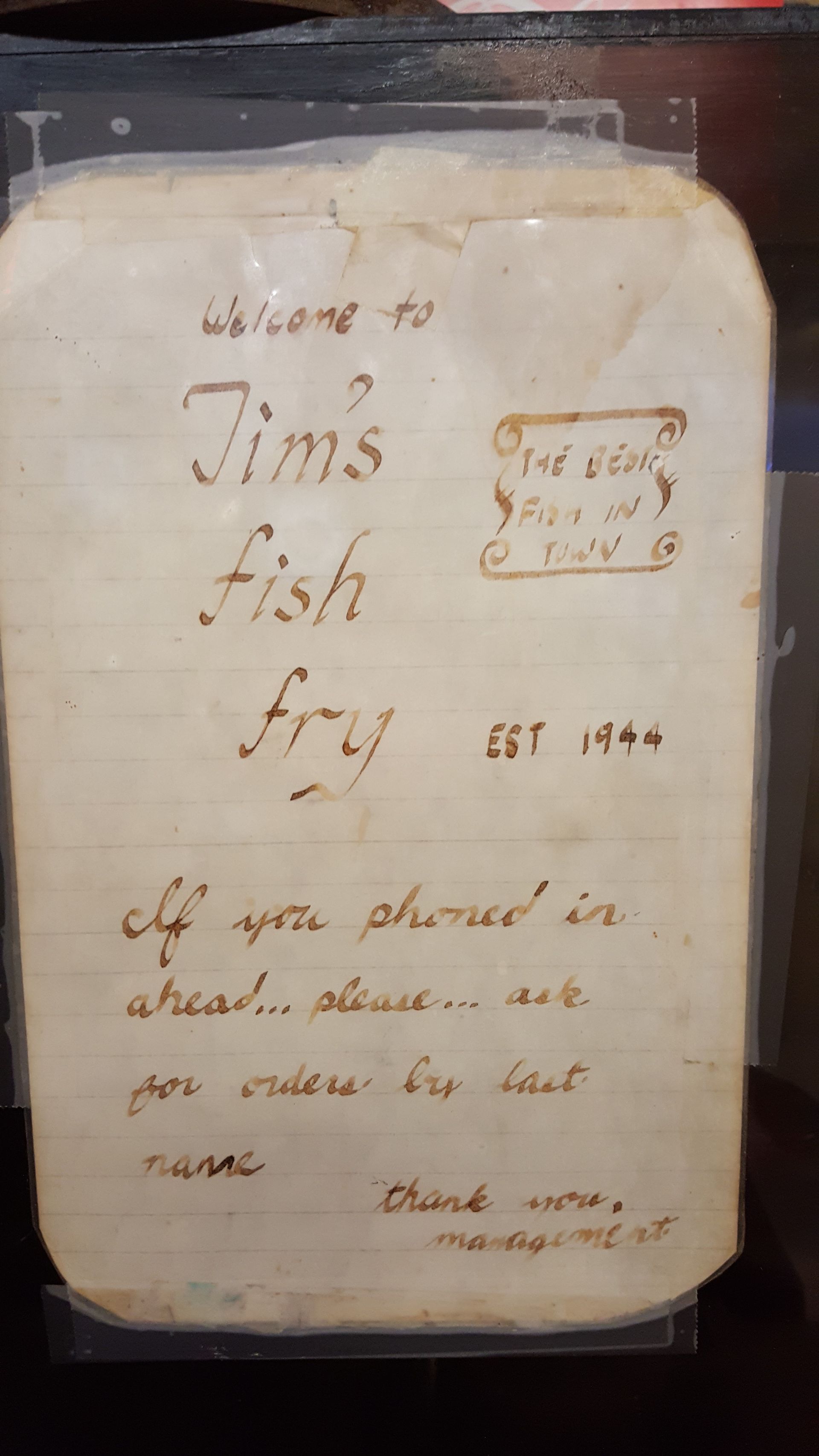 A piece of paper that says jim 's fish fry on it