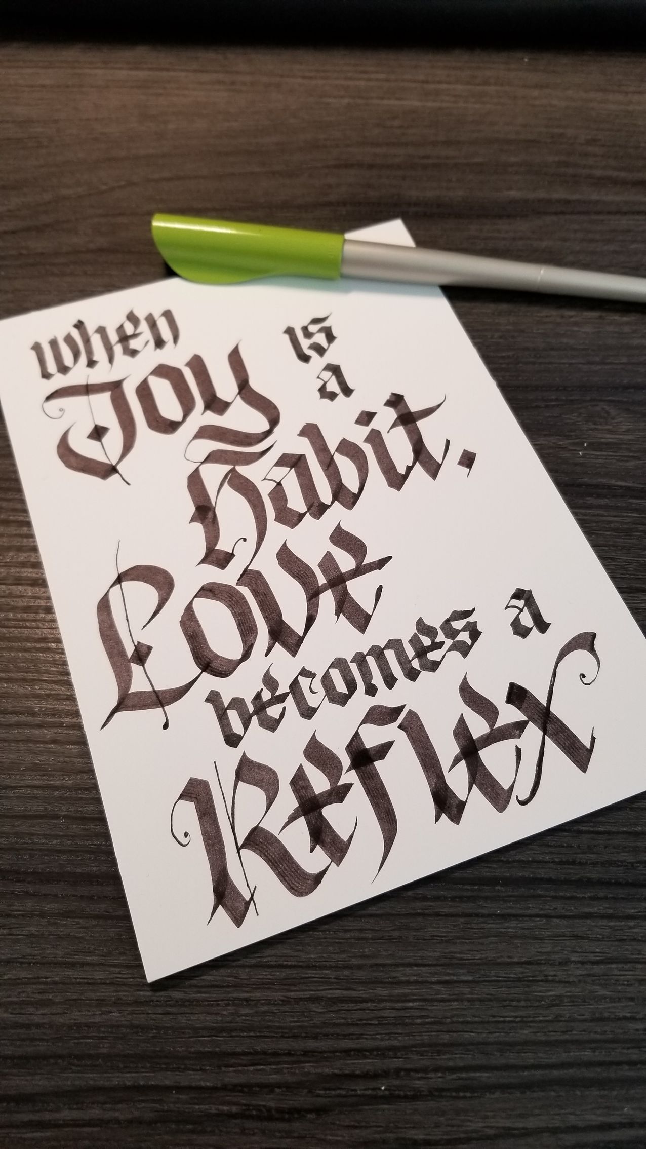 A piece of paper that says when joy is a habit love becomes a reflex