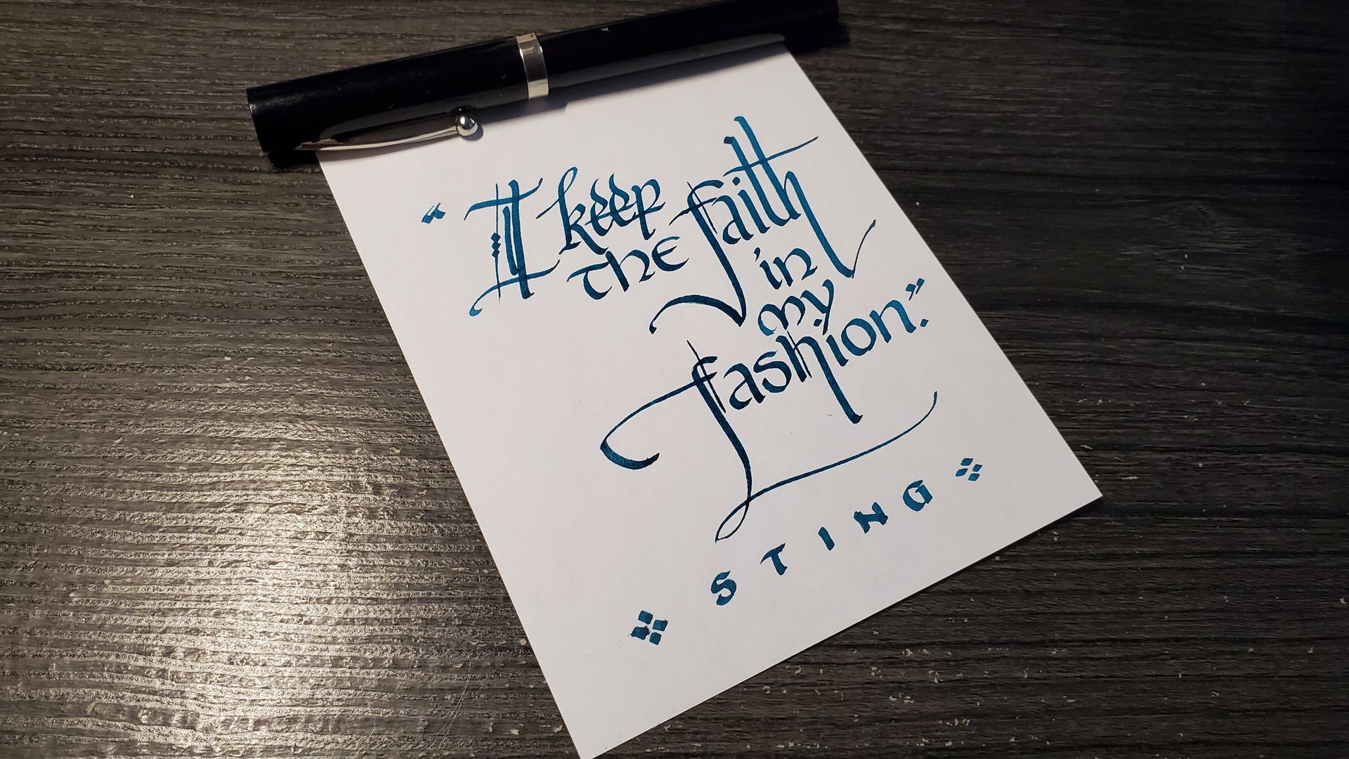 A piece of paper that says i keep faith in my fashion