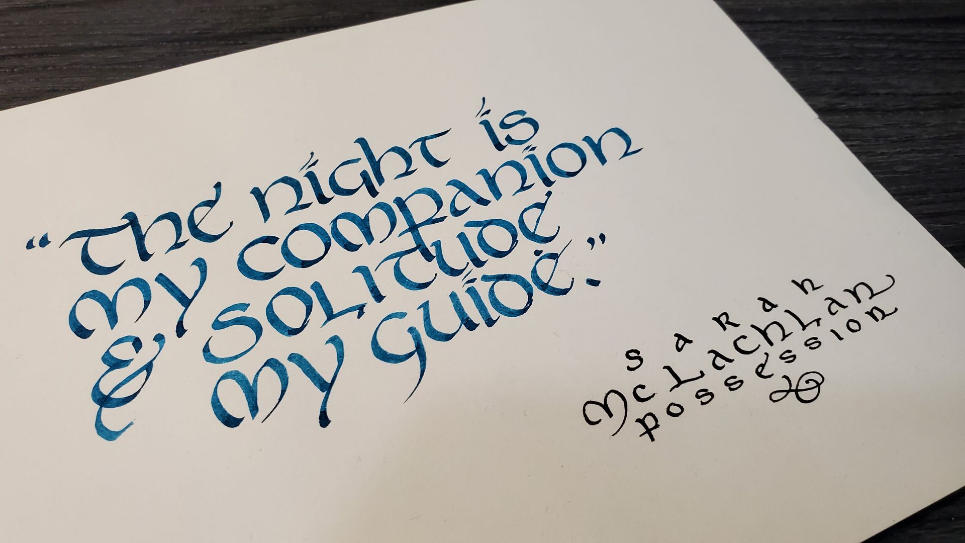 A piece of paper that says the night is my companion and solitude my guide