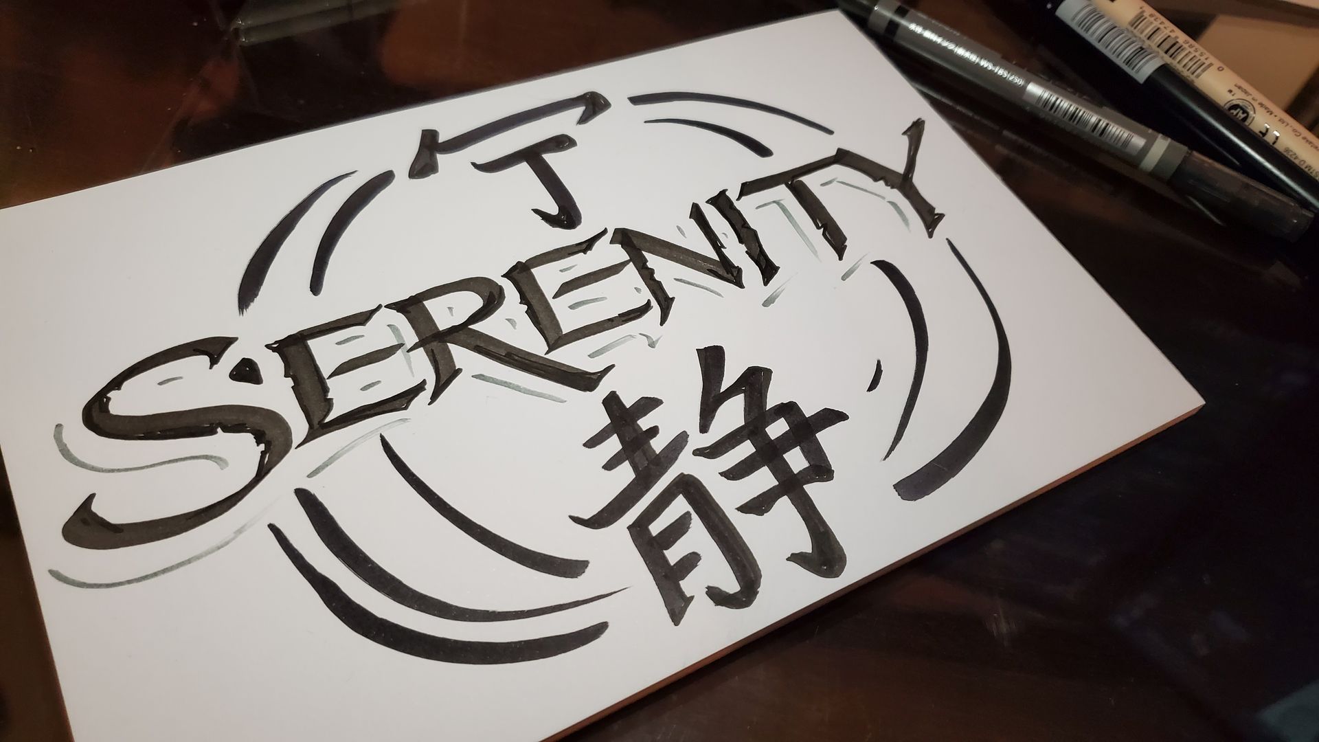 A piece of paper with the word serenity written on it