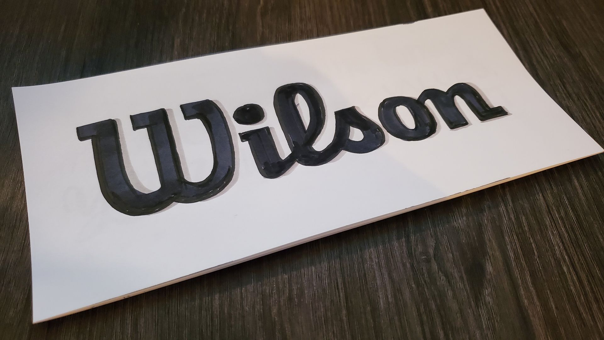 A piece of paper with the word wilson on it
