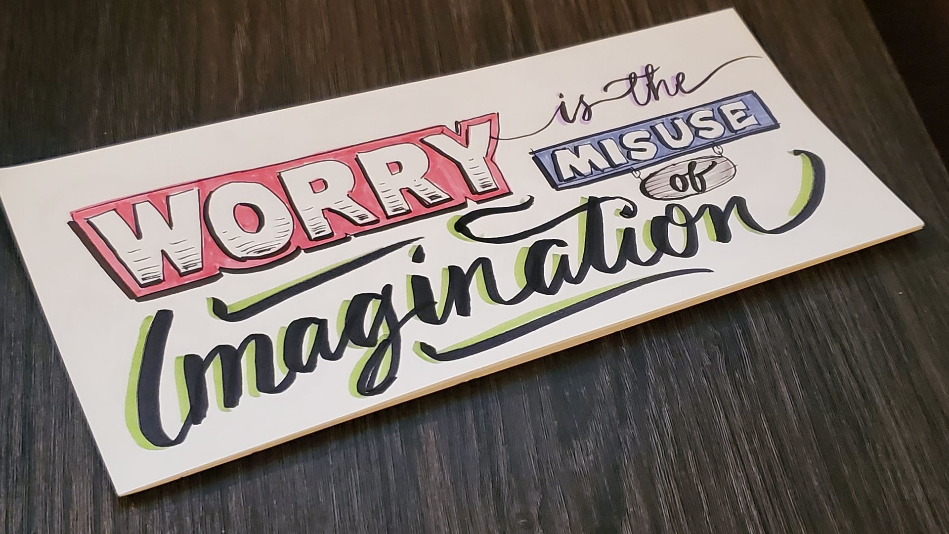 A sign that says worry is the misuse of imagination
