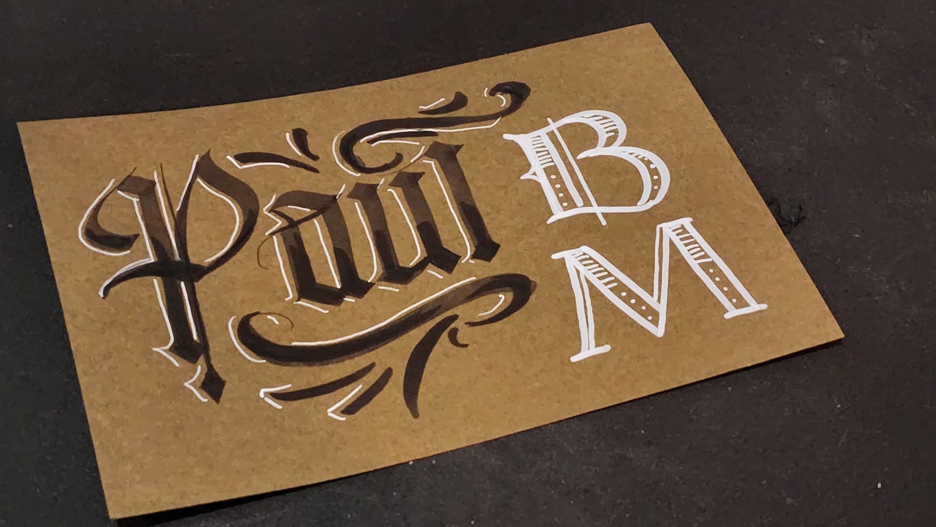 A piece of paper with paul bm written on it