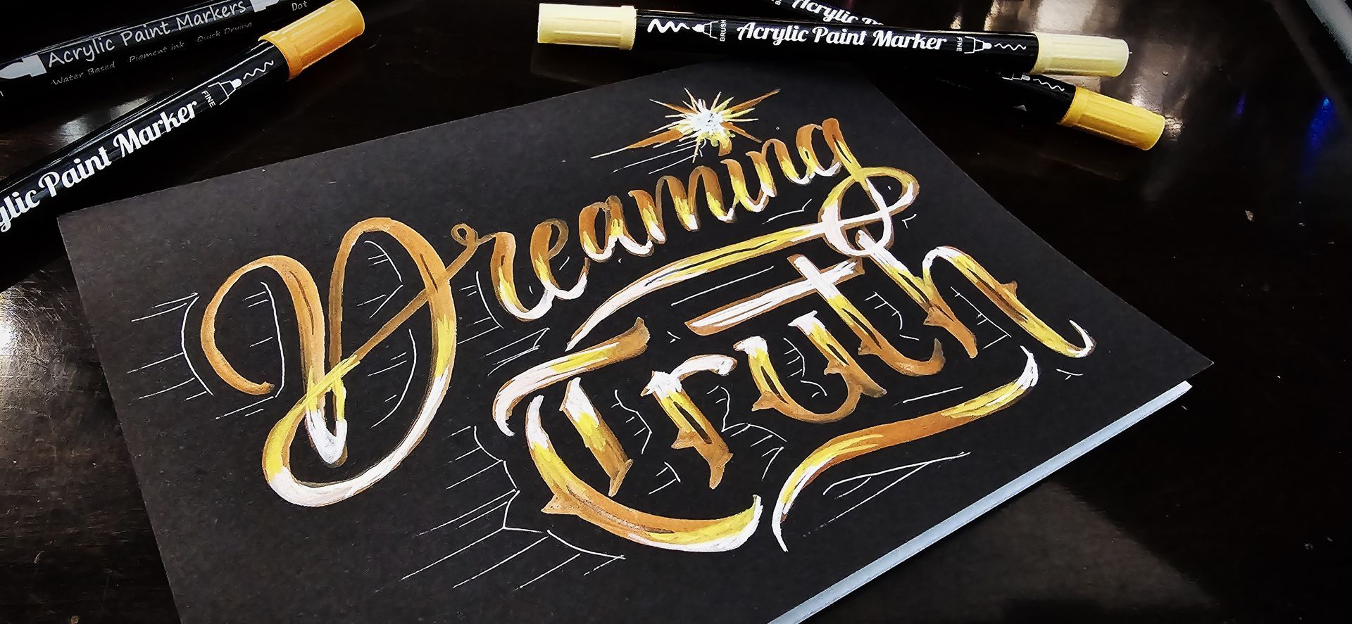 Acrylic chalk paint on matte black journal cover for Twitch user DreamingTruth