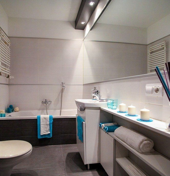 bathroom with white and blue towels