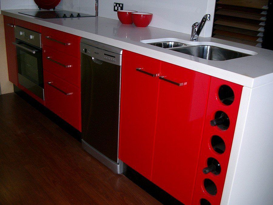 kitchen with red drawers