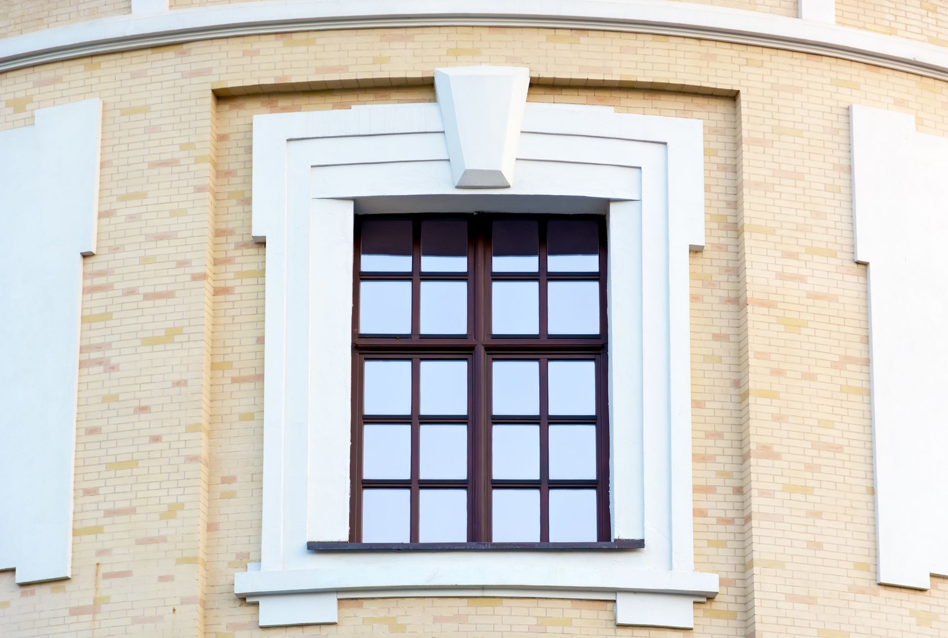 A close up of a window on the side of a building.