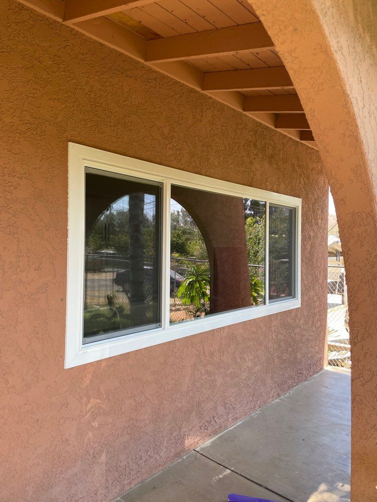 A large window on the side of a house.