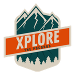 A logo for explore the pocodos with mountains and trees