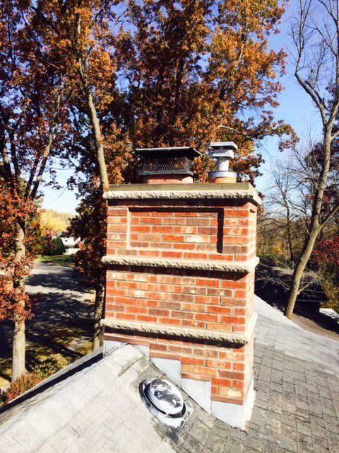 Roof with Brick Chimney_Brick Crack Repairs_Rochester, MN