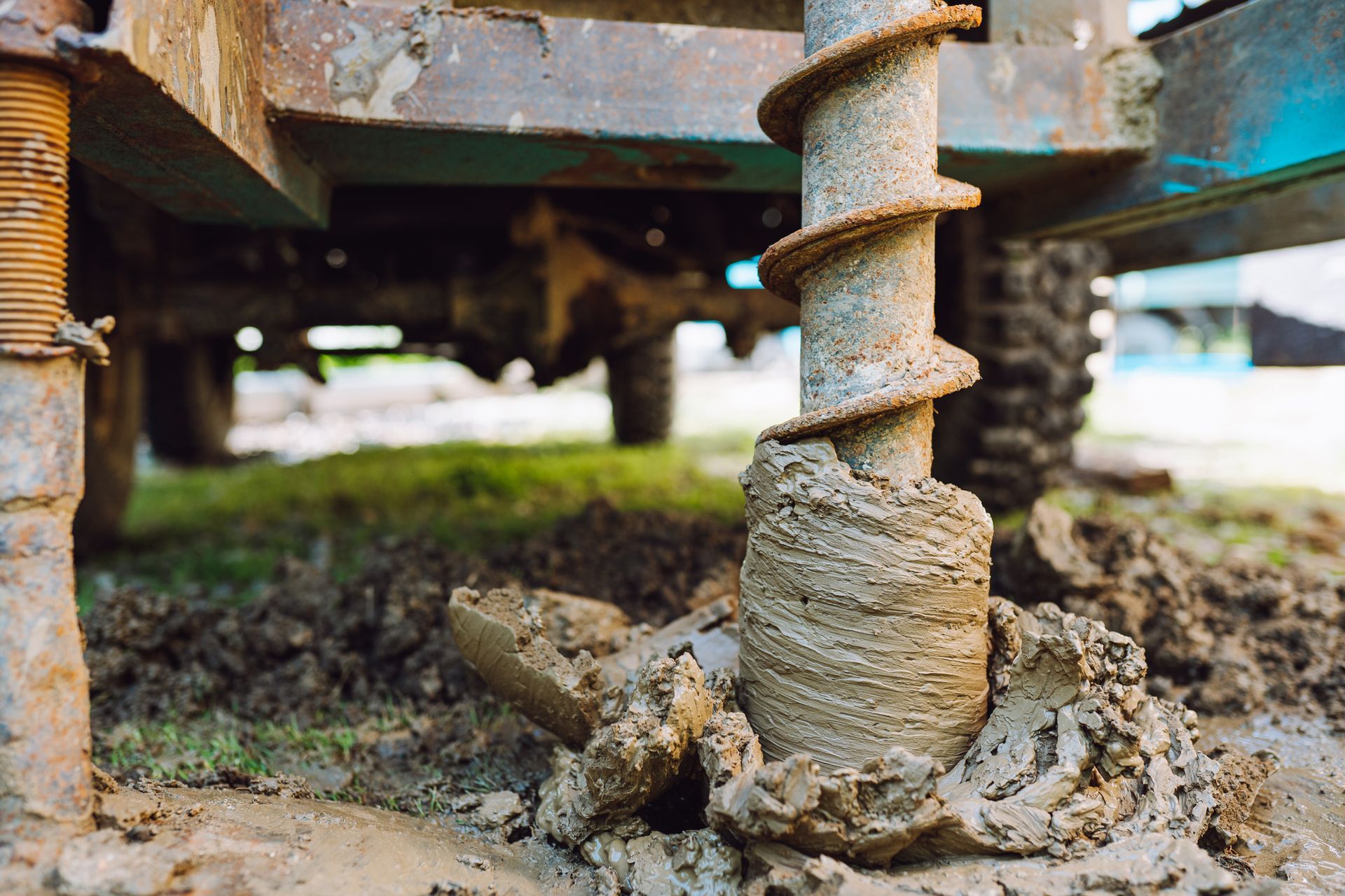 Emergency well repair drilling rig operating on groundwater borehole site.