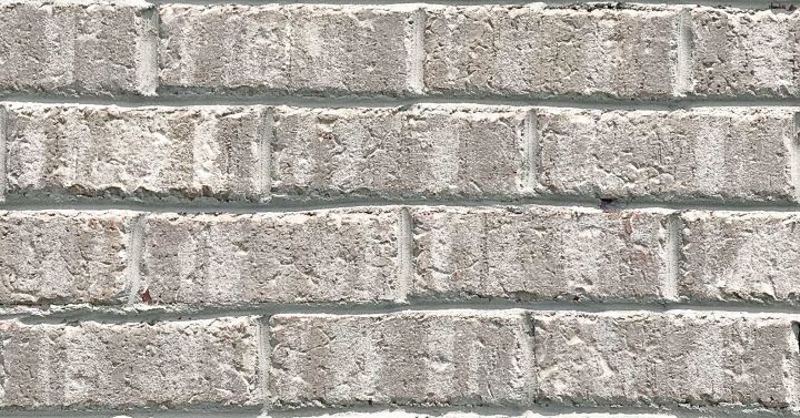 Gray and white brick wall, horizontal pattern.