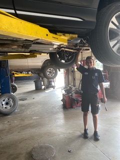 Our Mechanic Under Car in Boulder, CO - J & S Automotive
